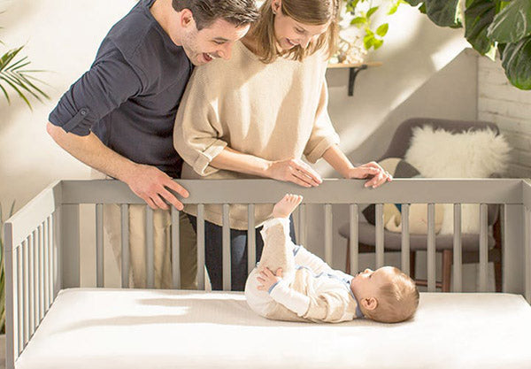 satara-home-naturepedic-classic-organic-chemical-free-crib-mattress-parents-with-baby-lifestyle-image