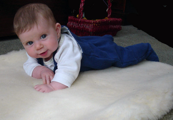 Holy-Lamb-Happy-Lamb-crib-organic-wool-topper-lifestyle