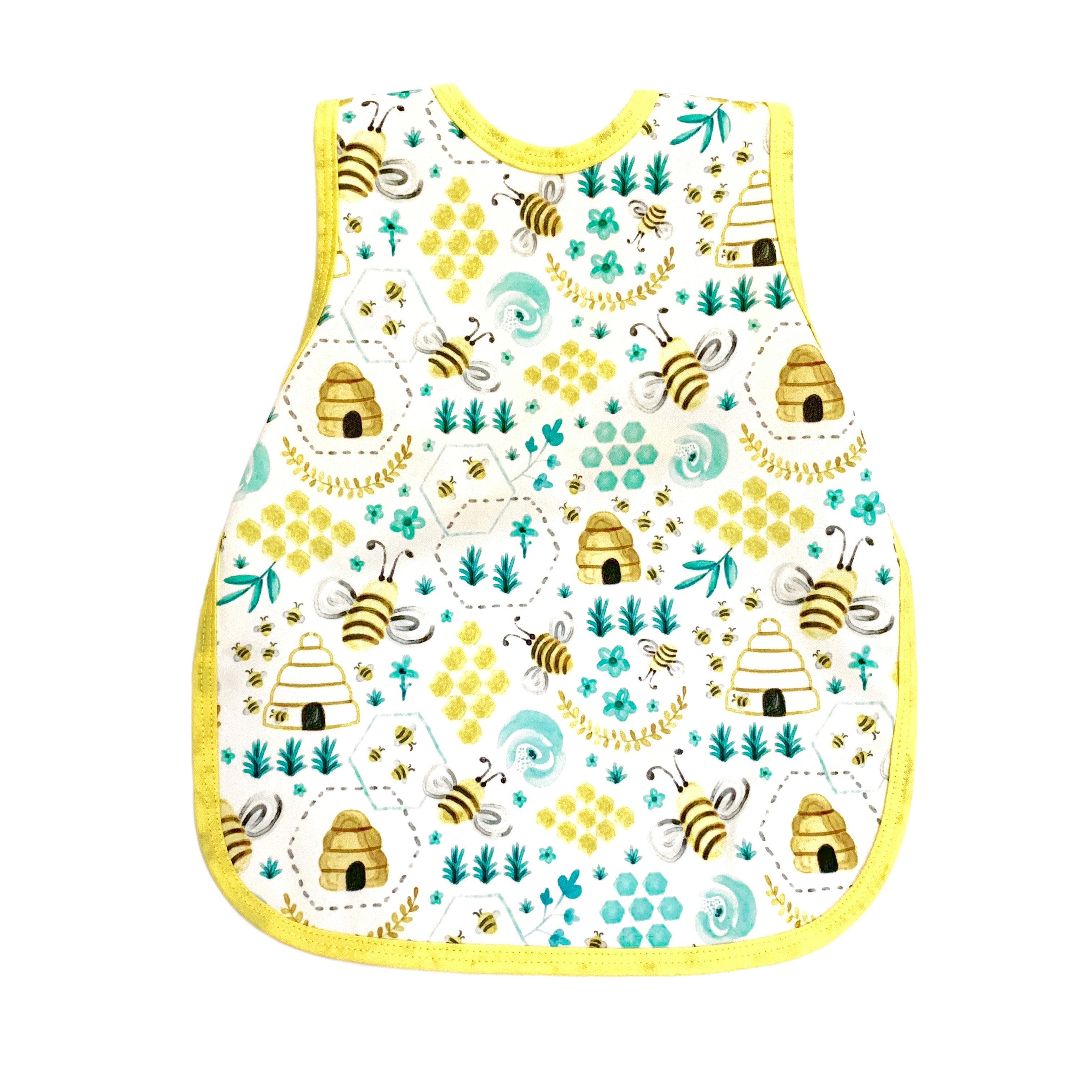 https://www.satarahome.com/cdn/shop/products/Satara-baby-bapronbaby-bib-apron-BusyBees_2048x@2x.jpg?v=1628699625