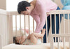satara-home-naturepedic-organic-breathable-2-stage-chemical-free-crib-mattress-mom-with-baby-lifestyle-image